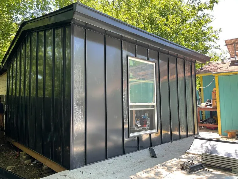 Black standing seam metal wall panels for Roof Inspection in Fort Irwin